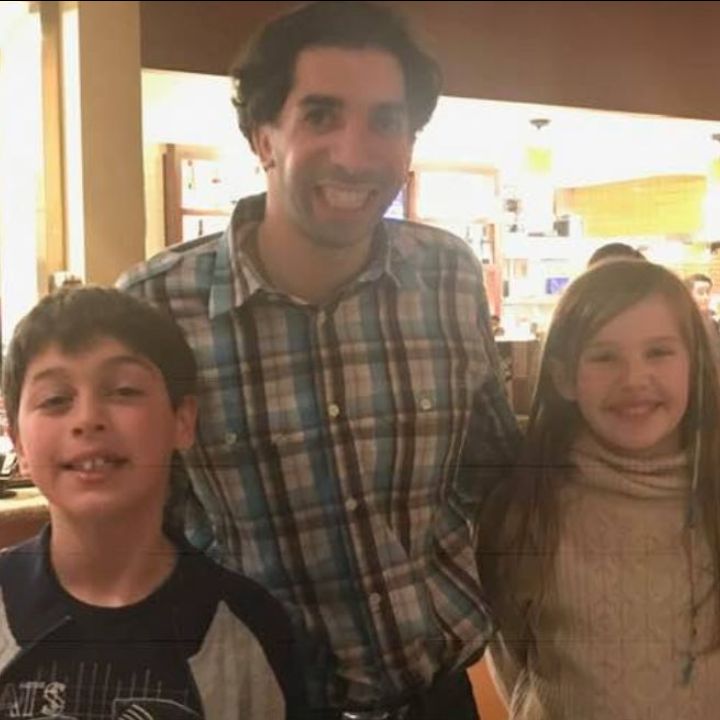 Sam Drazin with two California students