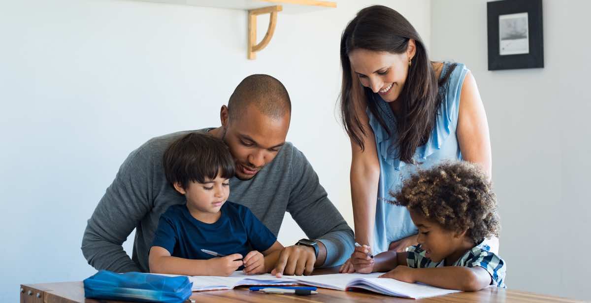 Parents helping children with homework